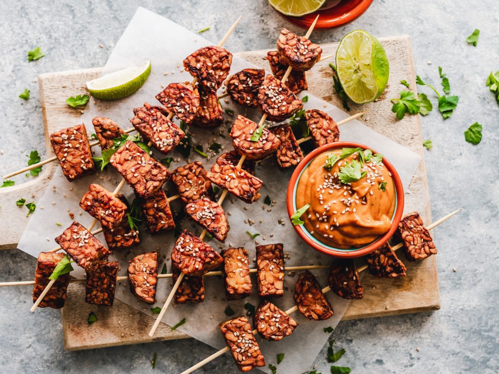 tempeh on skewers with peanut dipping sauce helpful for menopause symptom relief