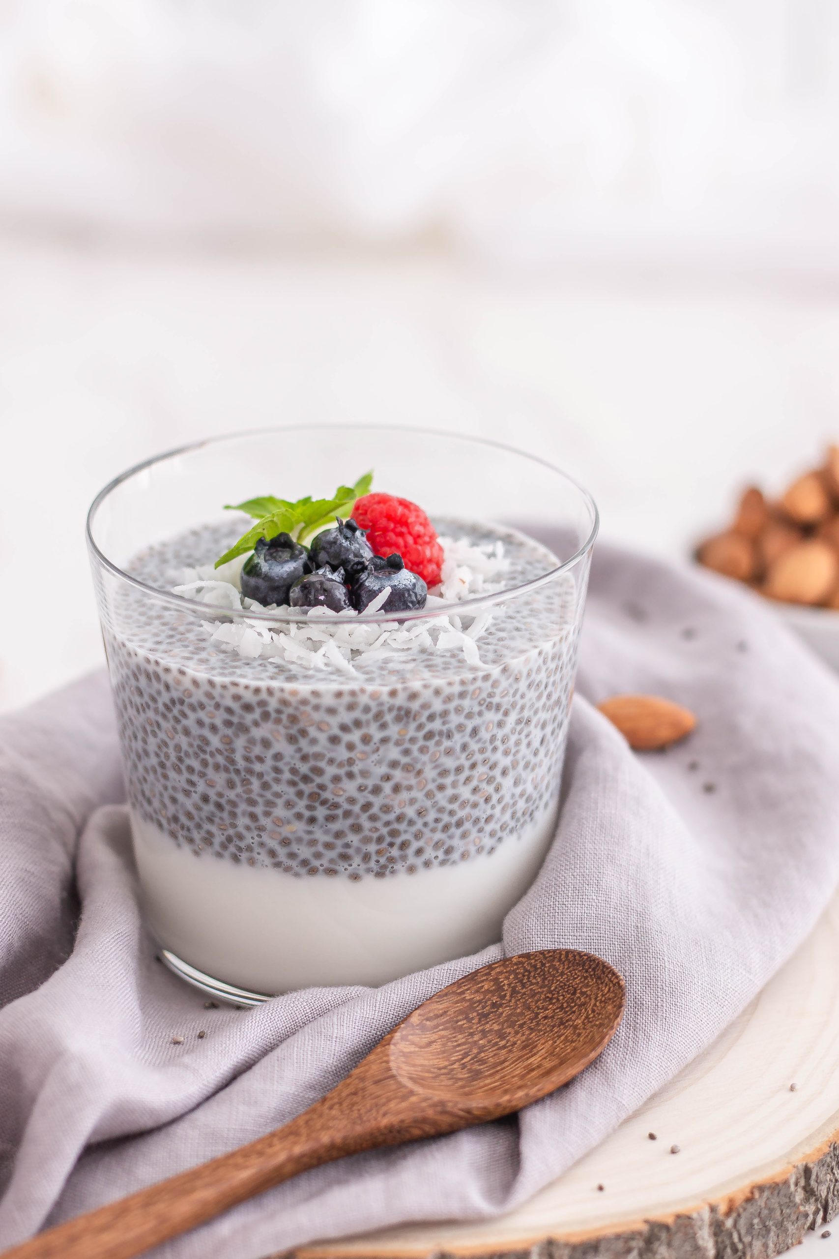 Chia Pudding topped with berries and coconut helpful for menopause symptom relief